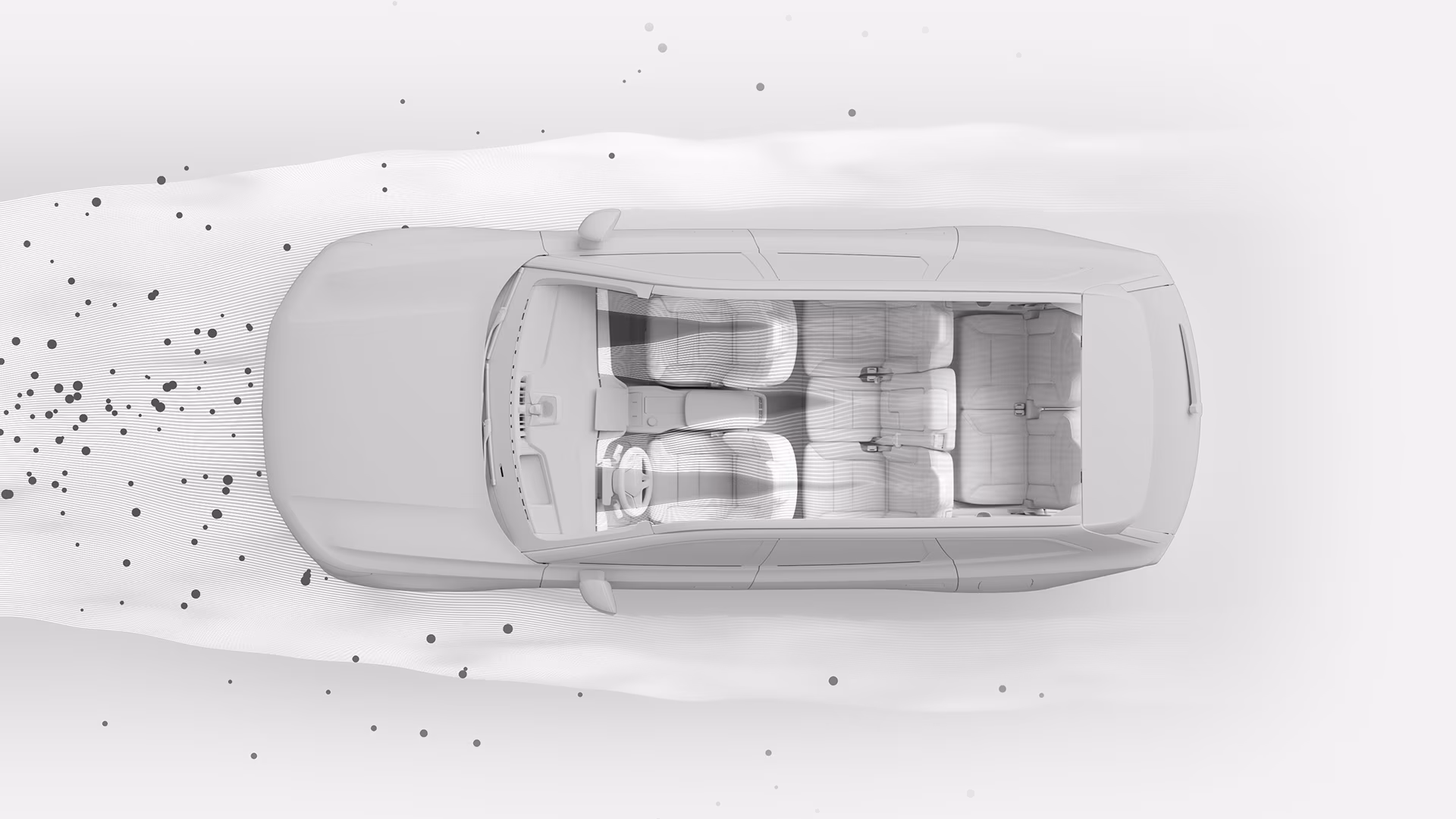 Вид сверху на иллюстрацию салона автомобиля Volvo, демонстрирующую расположение сидений и схемы воздушных потоков вокруг автомобиля.