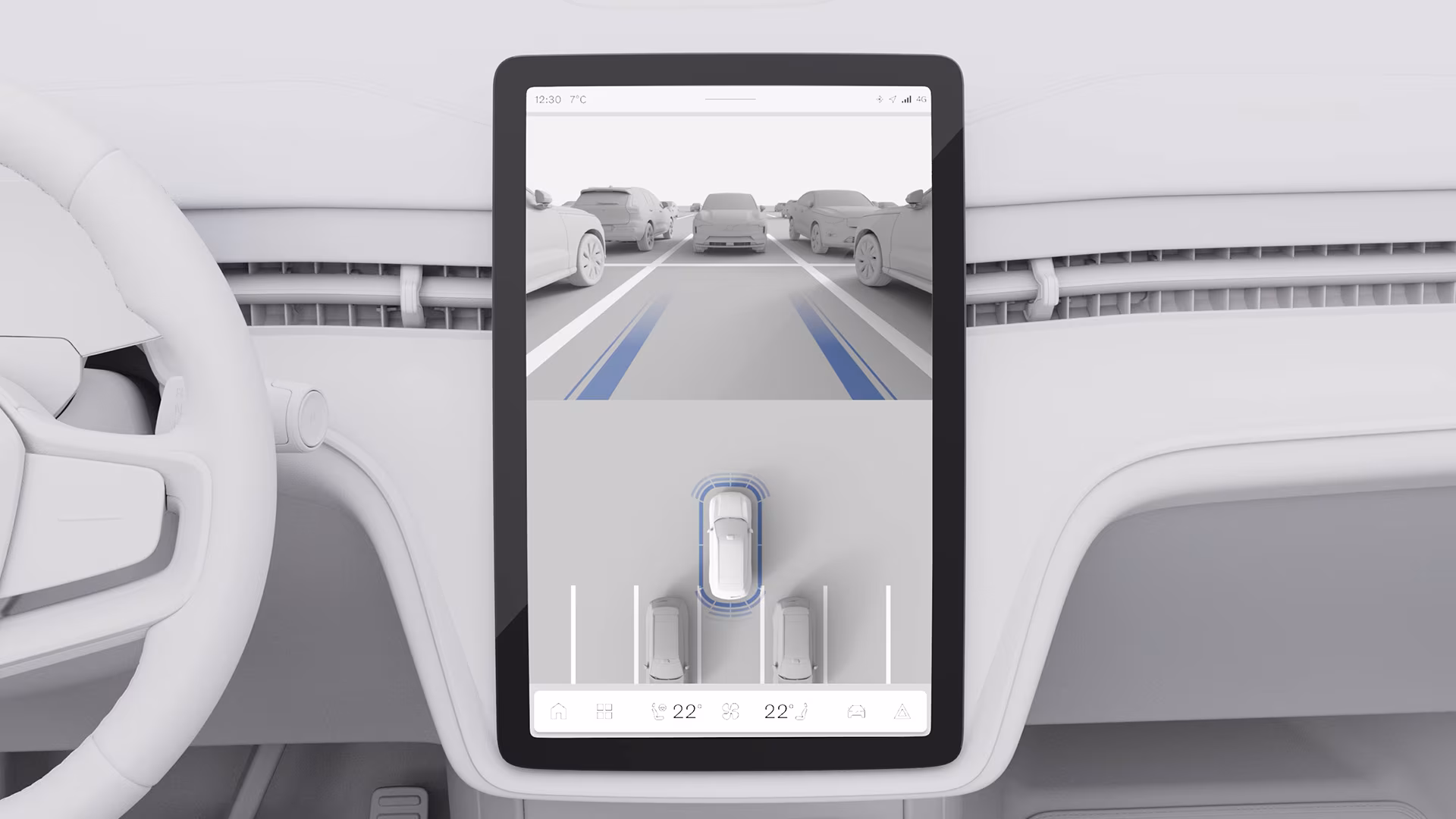 На центральном дисплее автомобиля Volvo отображается система помощи при парковке с камерой заднего вида и линиями управления парковкой.