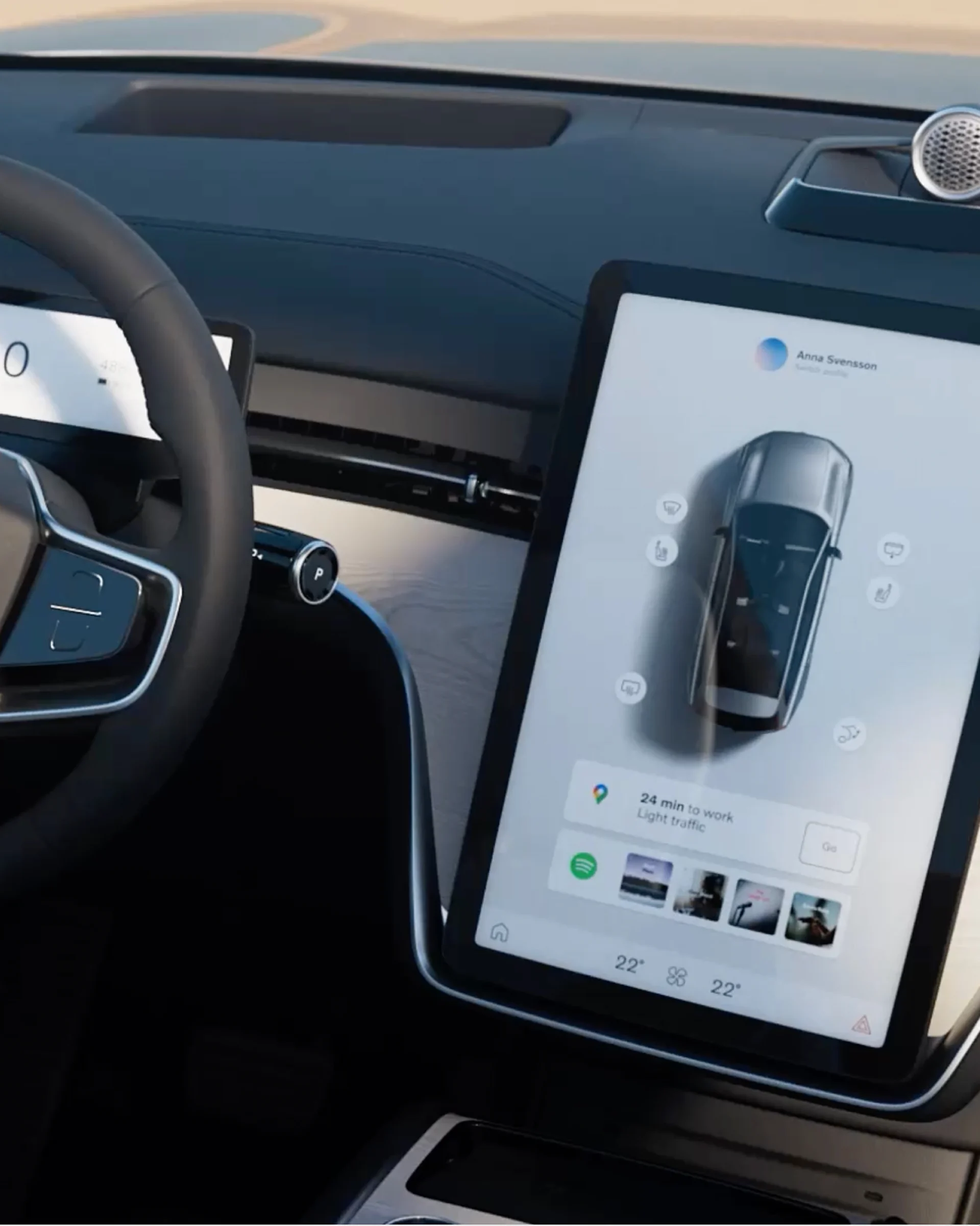 Салон Volvo EX90 с рулевым колесом и центральным сенсорным дисплеем.