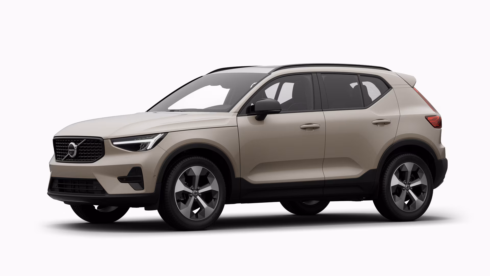 Экстерьер автомобиля Volvo в три четверти, однотонный студийный фон.